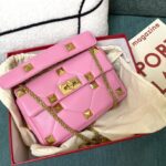 valentino pink valentino garavani roman stud medium napa sheep leather big nail bag